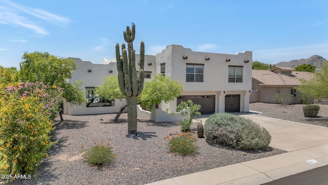 3611 E Ahwatukee Dr, Phoenix, AZ 85044 - southwest-style home with a garage, concrete driveway, and stucco siding
