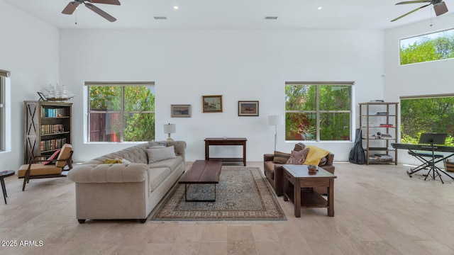 3611 E Ahwatukee Dr, Phoenix, AZ 85044 - living area with a ceiling fan, a towering ceiling, and recessed lighting