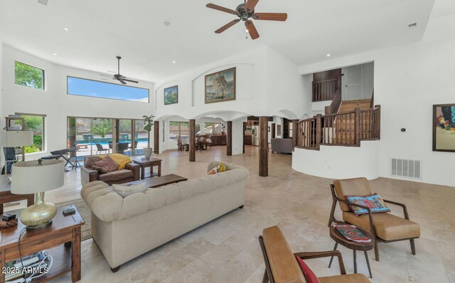 3611 E Ahwatukee Dr, Phoenix, AZ 85044 - living area with a ceiling fan, a high ceiling, recessed lighting, and stairway