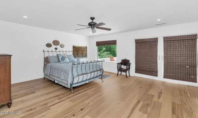 3611 E Ahwatukee Dr, Phoenix, AZ 85044 - bedroom with light wood-style floors, recessed lighting, and a ceiling fan