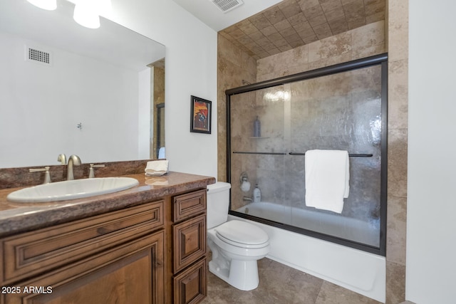 3611 E Ahwatukee Dr, Phoenix, AZ 85044 - bathroom with vanity, shower / bath combination with glass door, and tile patterned flooring