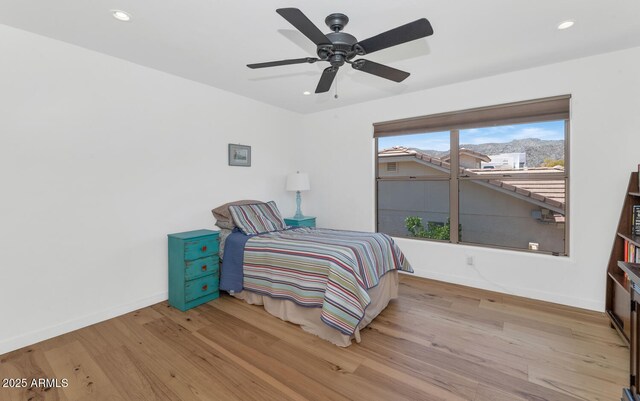 3611 E Ahwatukee Dr, Phoenix, AZ 85044 - bedroom featuring wood finished floors, recessed lighting, and a ceiling fan