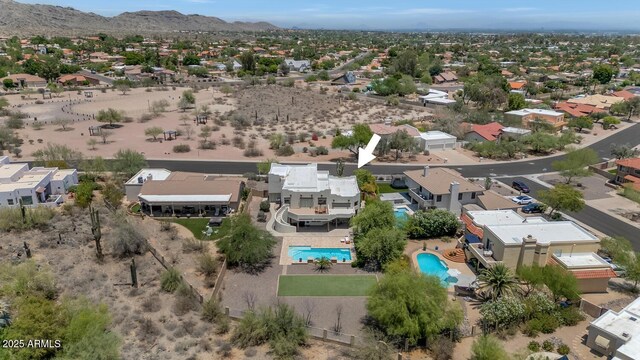 3611 E Ahwatukee Dr, Phoenix, AZ 85044 - aerial perspective of suburban area with a pool and a mountainous background