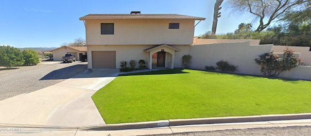 272 N Cucuracha St, Wickenburg, AZ 85390 - view of front of house with driveway, an attached garage, and stucco siding