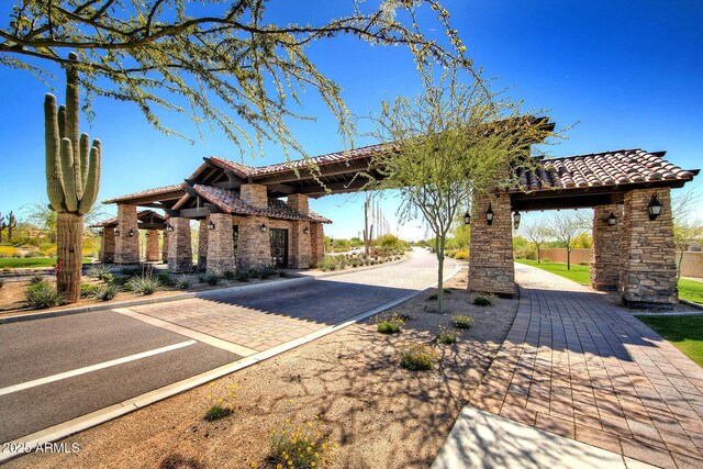 exterior space featuring a tile roof