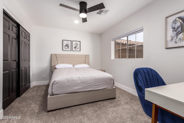 carpeted bedroom with ceiling fan