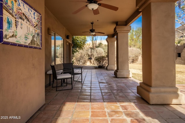 view of patio with ceiling fan