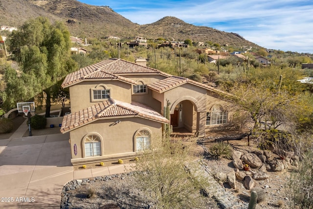 view of front of home with a mountain view