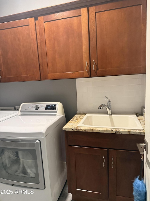 10236 W Wood St, Tolleson, AZ 85353 - laundry room featuring cabinet space and washing machine and clothes dryer