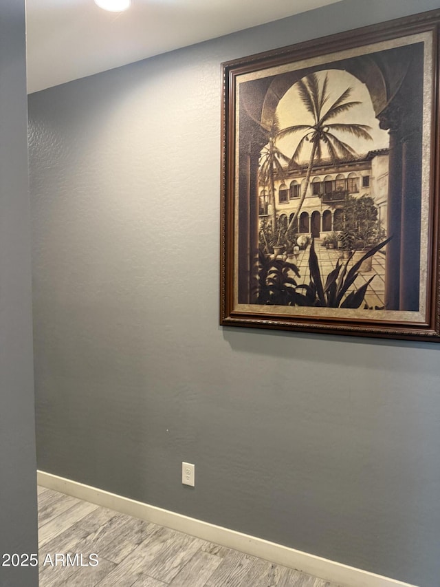 10236 W Wood St, Tolleson, AZ 85353 - detailed view of wood finished floors and baseboards