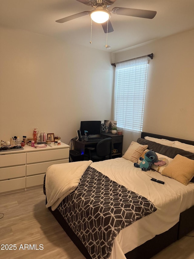 10236 W Wood St, Tolleson, AZ 85353 - bedroom featuring light wood finished floors and a ceiling fan