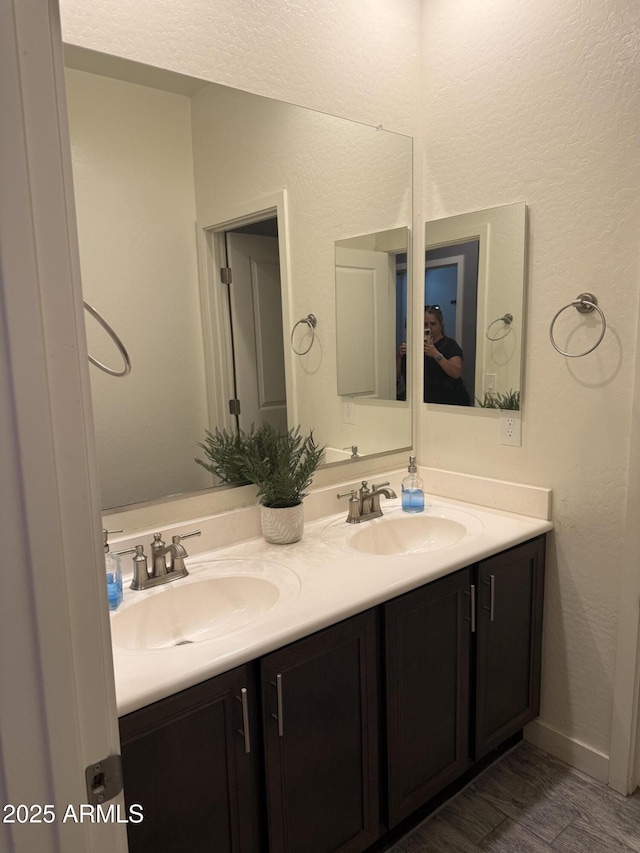 10236 W Wood St, Tolleson, AZ 85353 - full bath with double vanity and wood finished floors