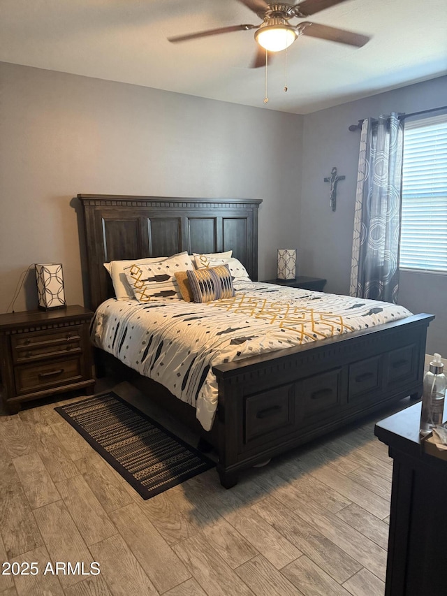 10236 W Wood St, Tolleson, AZ 85353 - bedroom with light wood-style floors and a ceiling fan