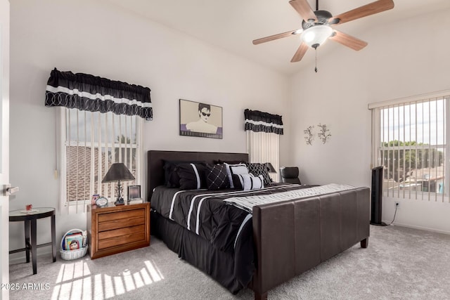 7460 E Kiowa Ave, Mesa, AZ 85209 - bedroom with carpet floors, ceiling fan, high vaulted ceiling, and baseboards