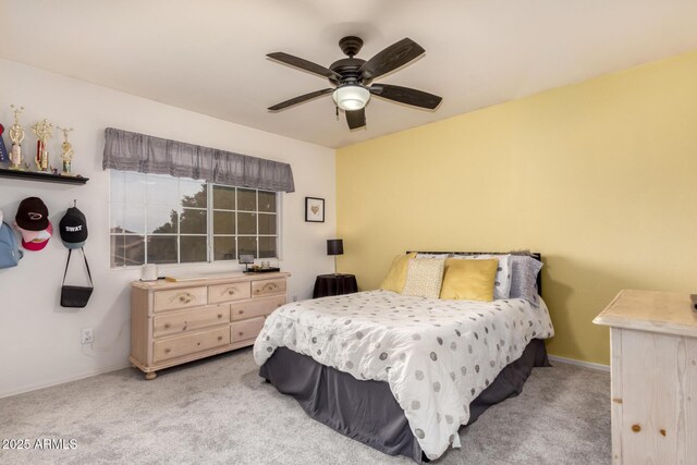 7460 E Kiowa Ave, Mesa, AZ 85209 - carpeted bedroom with ceiling fan and baseboards
