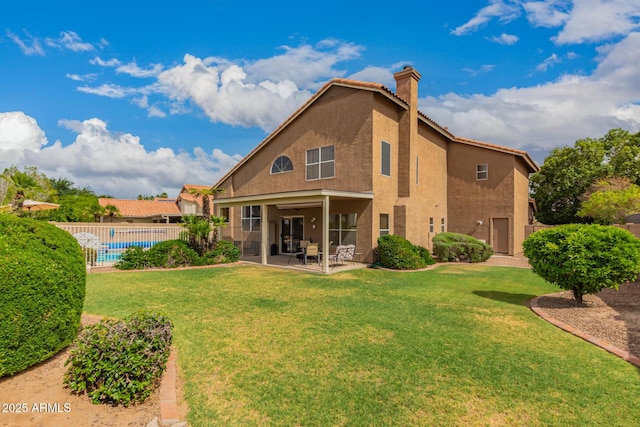 7460 E Kiowa Ave, Mesa, AZ 85209 - rear view of house with a patio area, stucco siding, and a chimney