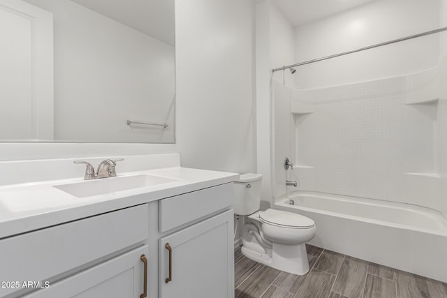 full bathroom with vanity, toilet, and shower / bathing tub combination