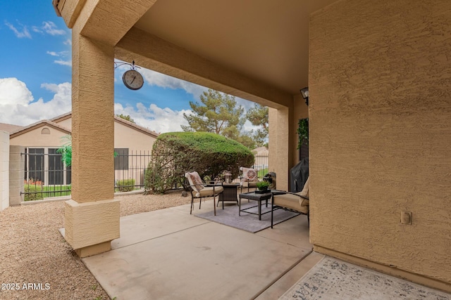 view of patio / terrace with fence