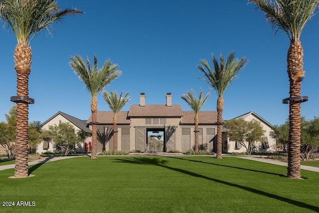 view of front facade with a front lawn