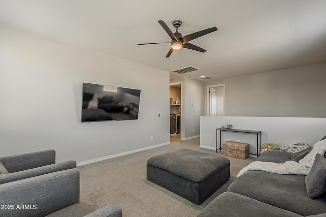 9352 E Saturn Ave, Mesa, AZ 85212 - carpeted living room with a ceiling fan and baseboards