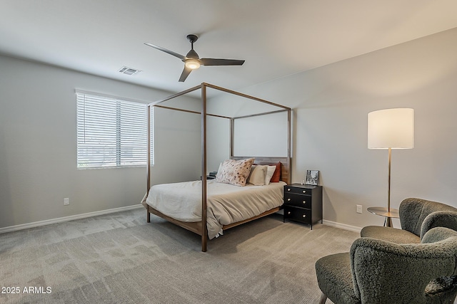 9352 E Saturn Ave, Mesa, AZ 85212 - bedroom featuring light carpet, baseboards, and a ceiling fan