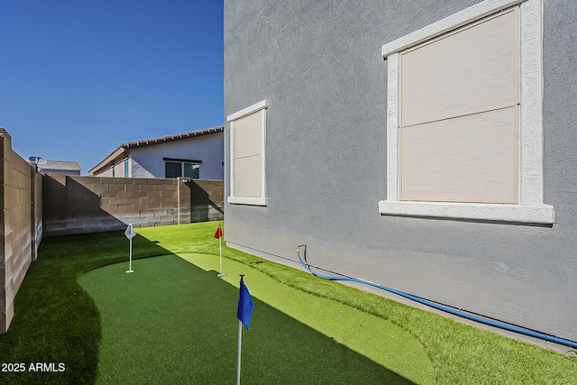 9352 E Saturn Ave, Mesa, AZ 85212 - fenced backyard with an area to practice putting
