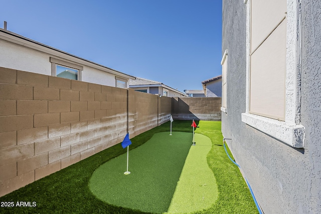 9352 E Saturn Ave, Mesa, AZ 85212 - fenced backyard with an area to practice putting