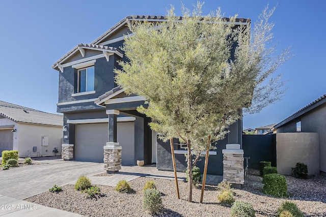 9352 E Saturn Ave, Mesa, AZ 85212 - craftsman inspired home featuring a garage, decorative driveway, stucco siding, and a tile roof