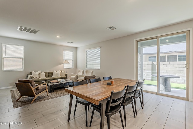 9352 E Saturn Ave, Mesa, AZ 85212 - dining area with recessed lighting and baseboards