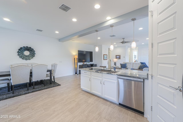 2929 E Mohave Ln, Apache Junction, AZ 85119 - kitchen featuring dishwasher, open floor plan, white cabinetry, light stone countertops, and pendant lighting