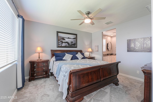2929 E Mohave Ln, Apache Junction, AZ 85119 - carpeted bedroom featuring ensuite bathroom and ceiling fan