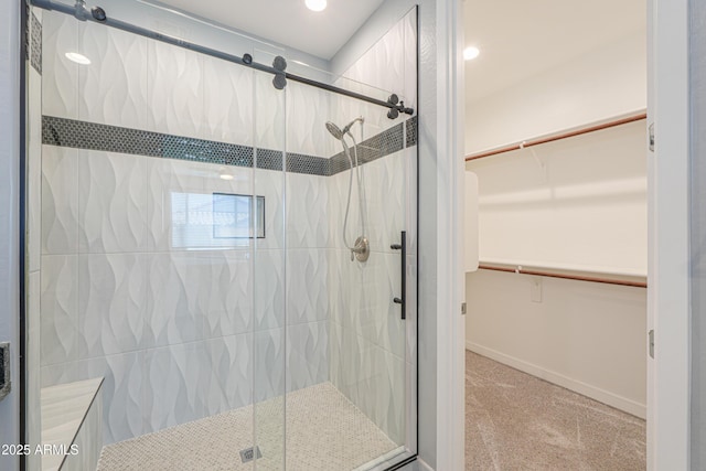 2929 E Mohave Ln, Apache Junction, AZ 85119 - bathroom with a stall shower, a spacious closet, and recessed lighting