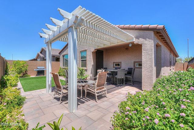 2929 E Mohave Ln, Apache Junction, AZ 85119 - fenced backyard with outdoor dining area, a pergola, a patio, and area for grilling