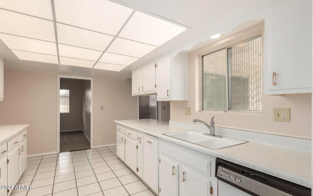 kitchen featuring white cabinets, sink, and white dishwasher