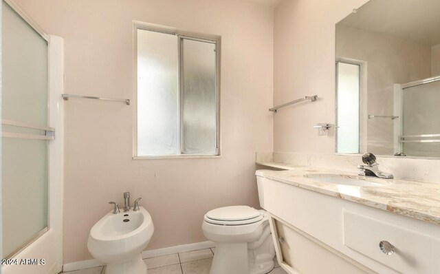 full bathroom featuring a bidet, toilet, tile patterned flooring, combined bath / shower with glass door, and vanity