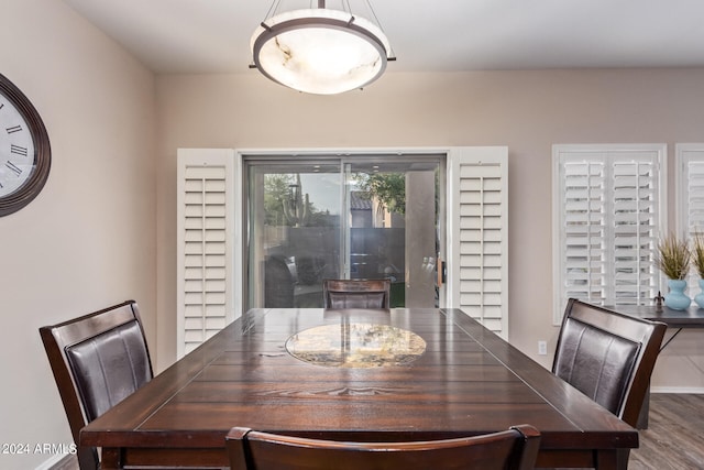 dining area with wood-type flooring