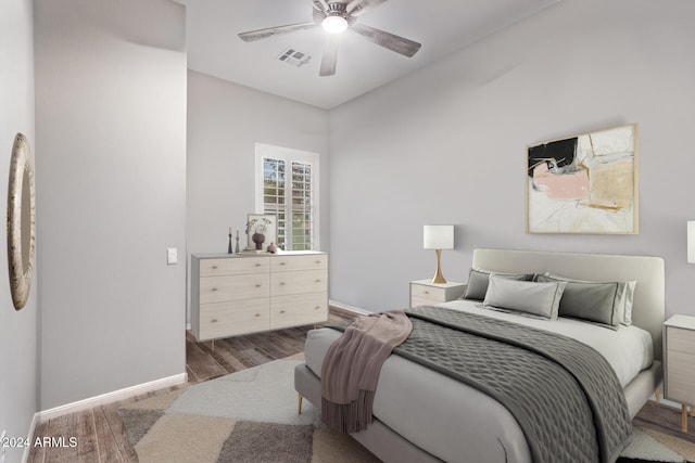 bedroom featuring ceiling fan and hardwood / wood-style floors