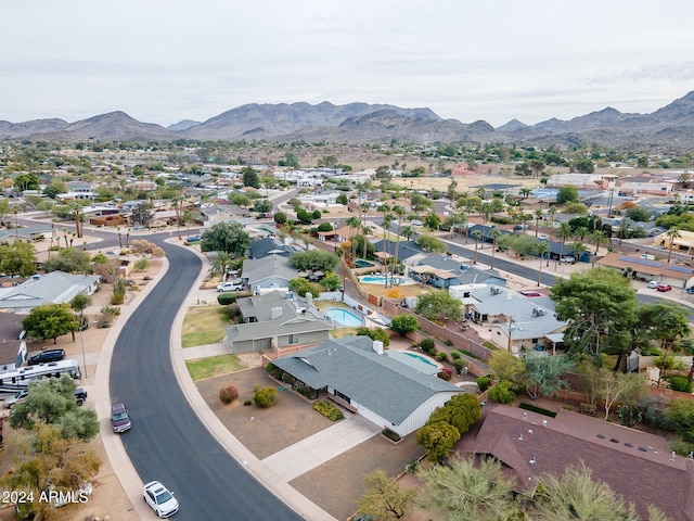 birds eye view of property featuring a mountain view