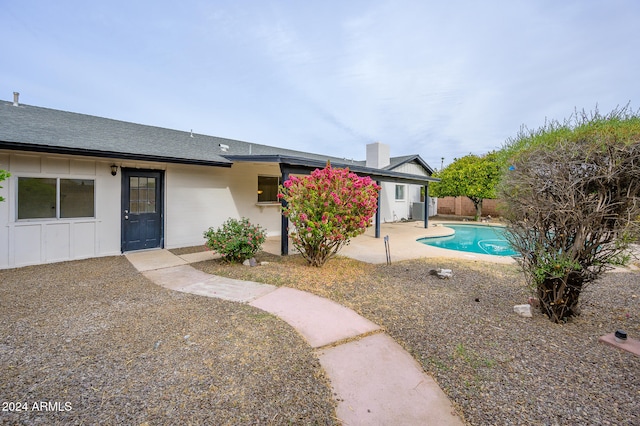 back of house with a patio area