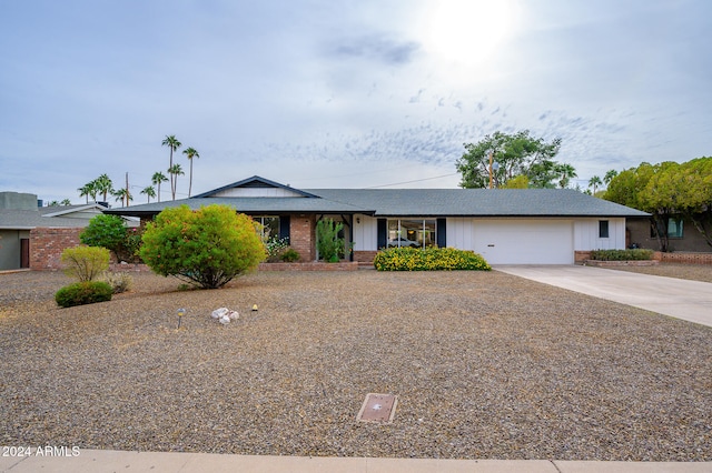 ranch-style home with a garage