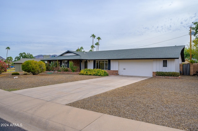 single story home featuring a garage