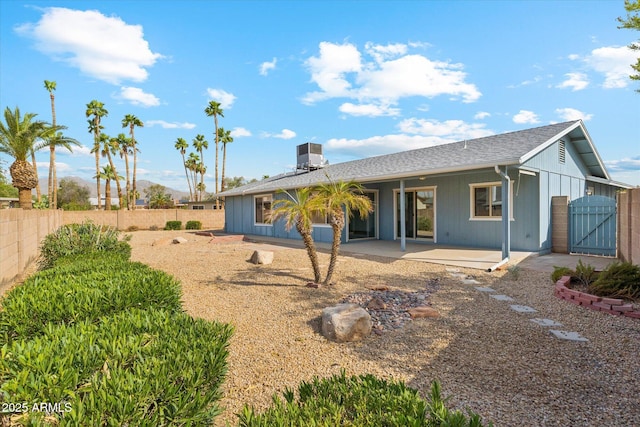 4829 E Apache Cir, Phoenix, AZ 85044 - back of property featuring a gate and a patio