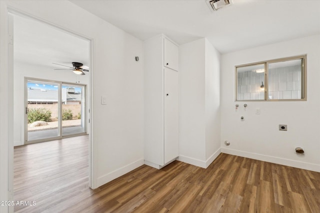 4829 E Apache Cir, Phoenix, AZ 85044 - spare room with wood finished floors and a ceiling fan