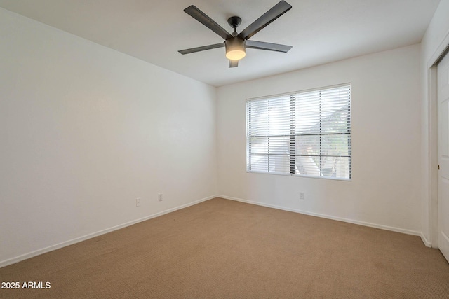 6885 E Cochise Rd Unit 219, Paradise Valley, AZ 85253 - unfurnished room with light colored carpet and a ceiling fan