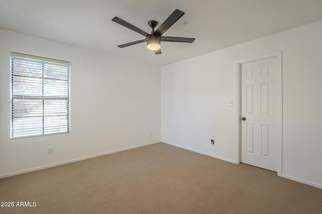 6885 E Cochise Rd Unit 219, Paradise Valley, AZ 85253 - empty room featuring a ceiling fan and light colored carpet