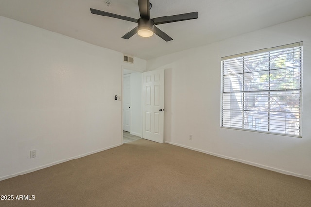 6885 E Cochise Rd Unit 219, Paradise Valley, AZ 85253 - unfurnished room featuring a ceiling fan and light colored carpet