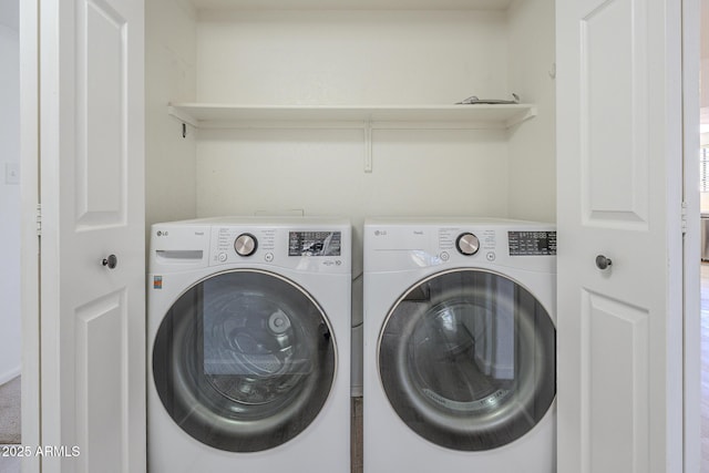 6885 E Cochise Rd Unit 219, Paradise Valley, AZ 85253 - laundry area featuring washing machine and clothes dryer