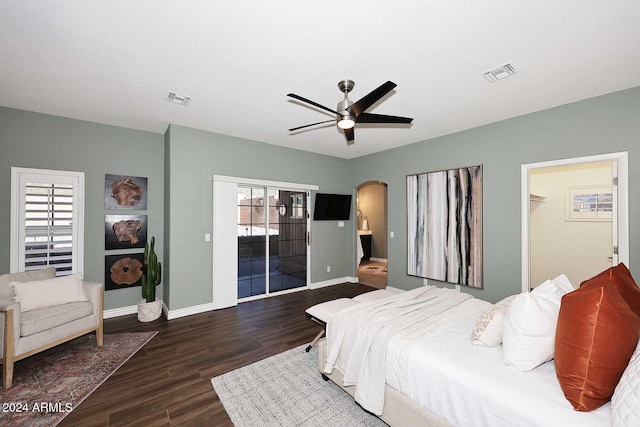 bedroom with access to outside, multiple windows, ceiling fan, and dark hardwood / wood-style floors