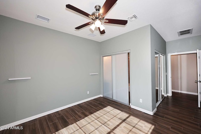 unfurnished bedroom featuring ceiling fan