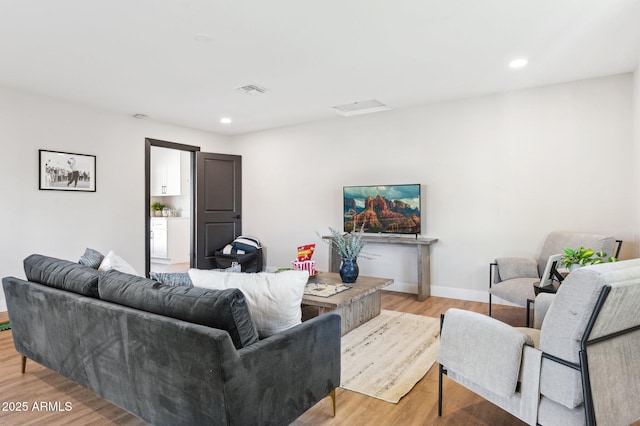 living room featuring light wood-type flooring